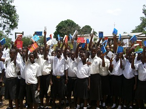 Children in Sierra Leone express their appreciation to Rotary for the gift of new dictionaries.