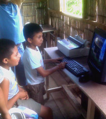 Children in Guayaquil, Ecuador, receive computer training in their new learning center.