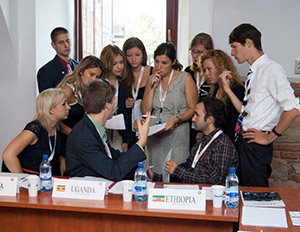 Delegates to the Rotaract Model UN in Romania practice diplomacy.