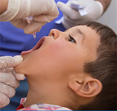 A child is immunized against polio.