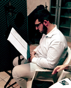 A member of the Rotaract Club of Caltanissetta, Sicily, records a section of an audio book.