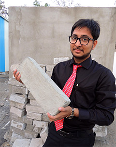 Desai and his brick